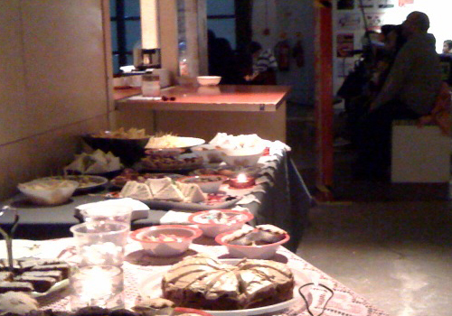 A fairly large spread was put on of cakes & cucumber sandwiches